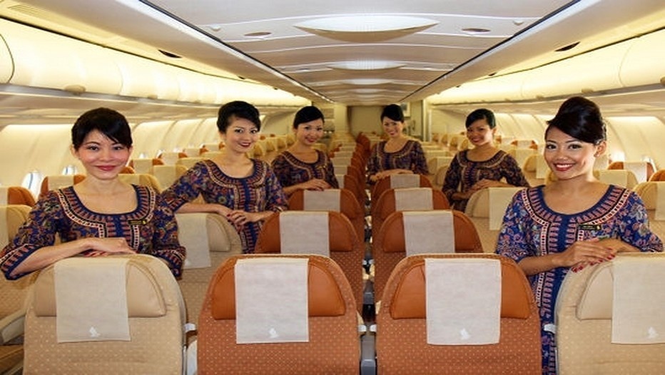 Hôtesses de la Compagnie Singapore Airlines (Photo l'Internaute) Hôtesses de la Compagnie Singapore Airlines (Photo l'Internaute)